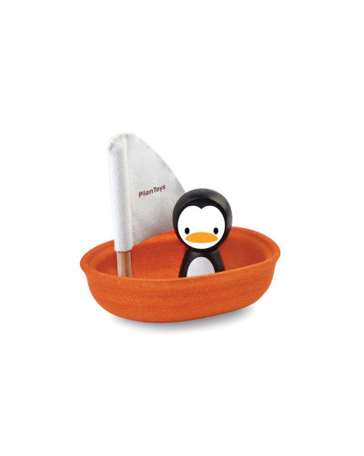 Wooden sailing boat penguin